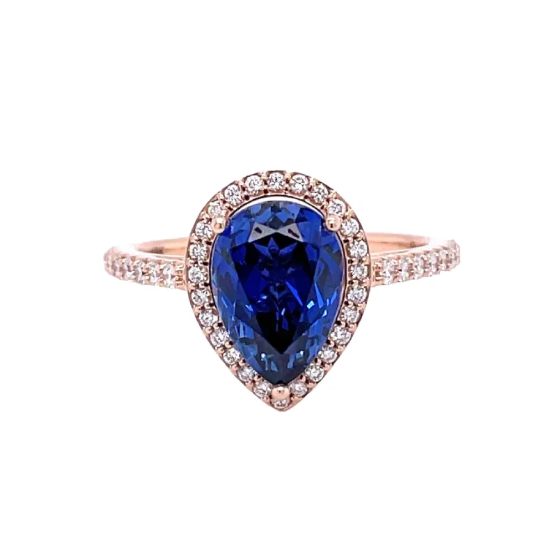 Blue Sapphire Pear Engagement Ring with Diamond Halo