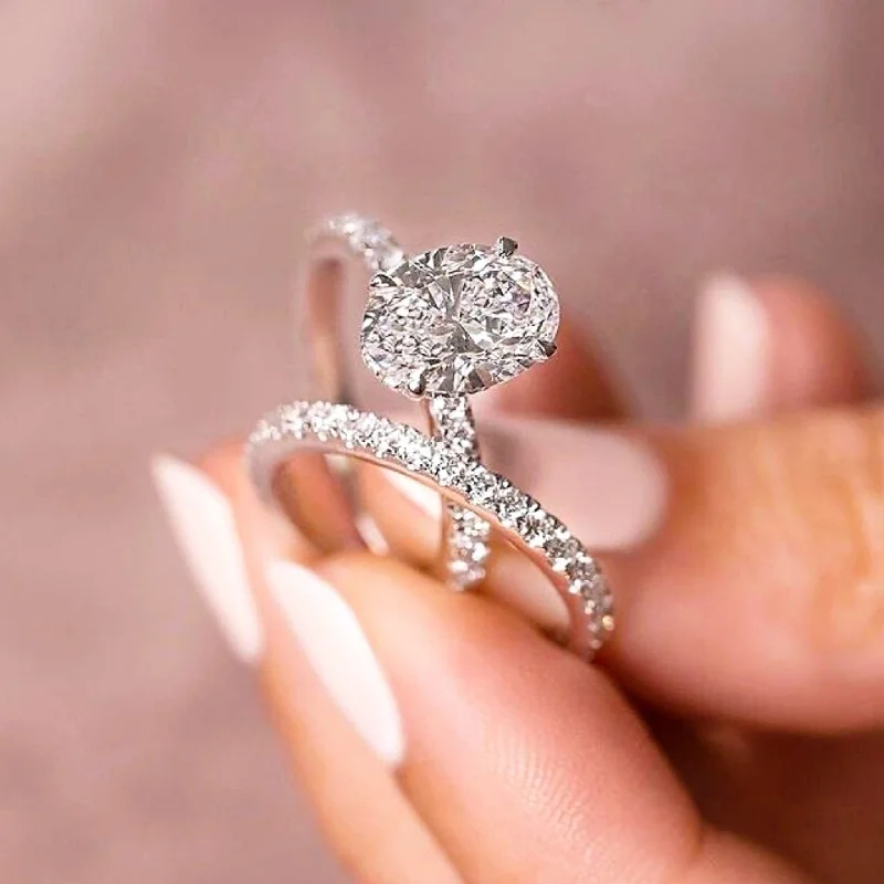 Oval Diamond Engagement Ring and Wedding Band